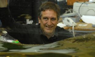 Professor Ian Bryden running wave tests in the curved tank at the Institute for Energy Systems